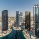 Illustration highlighting 5 key tips for finding the best web development services in Jumeirah Lake Towers (JLT), Dubai